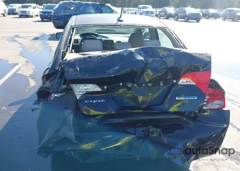 2010 Honda Civic Hybrid from USA, damaged, VIN JHMSA3F21AS005780